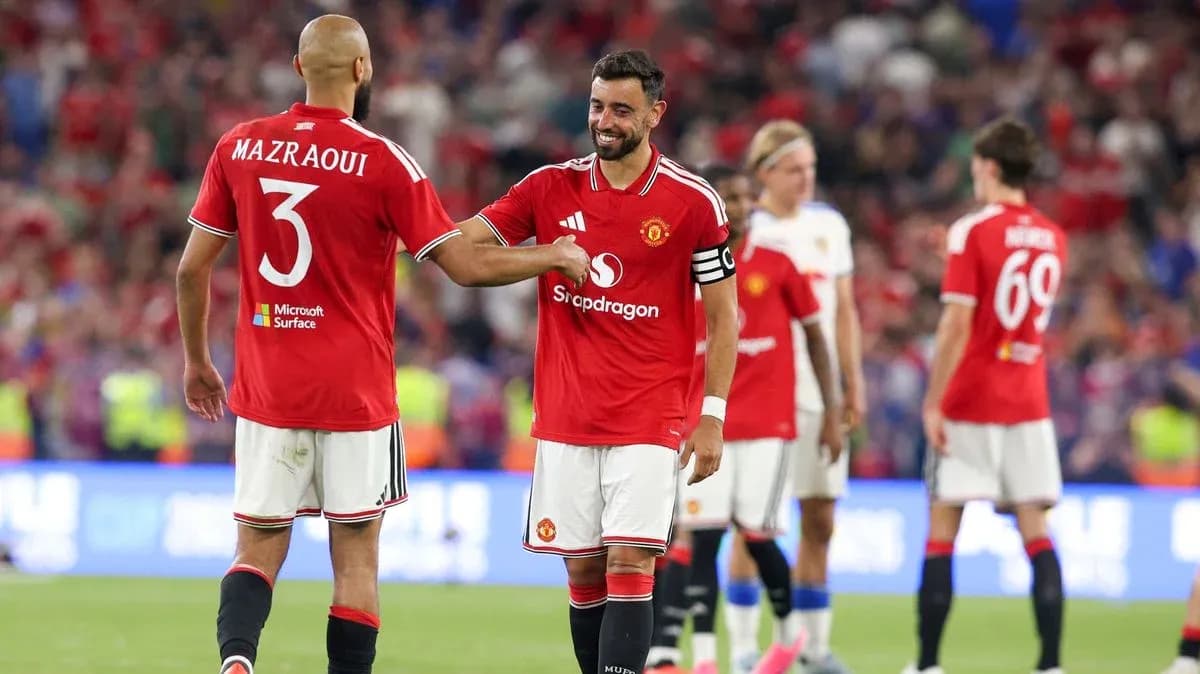 Bruno Fernandes and Mazraoui celebrating during match Bruno Fernandes and Mazraoui celebrating during match
