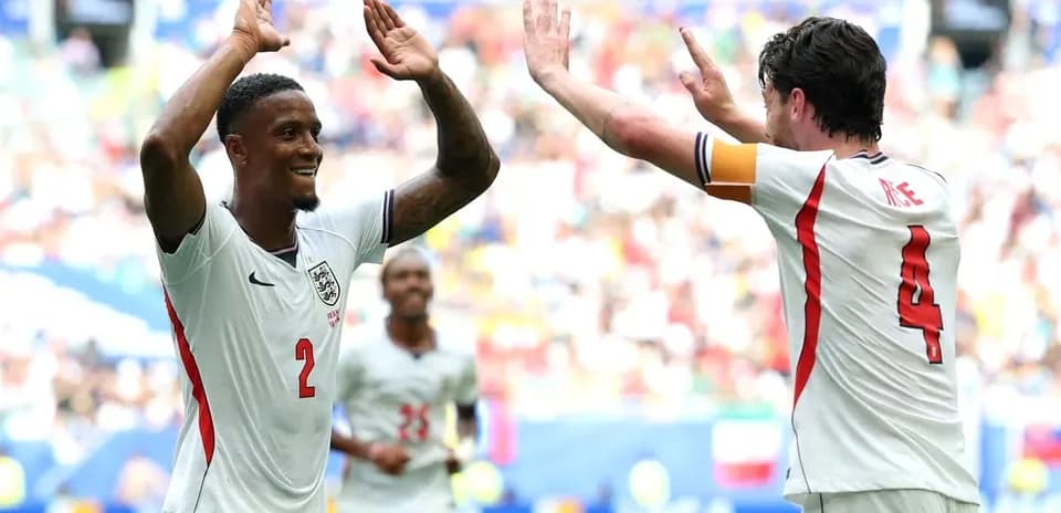 Two England players celebrating a goal during match Two England players celebrating a goal during match