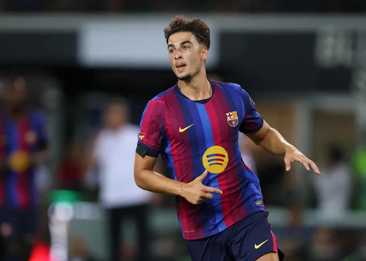 Player celebrating after scoring a goal for Barcelona Player celebrating after scoring a goal for Barcelona
