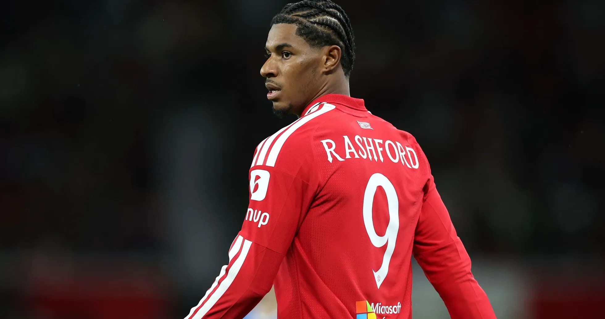 Player in red jersey with number 9 during match Player in red jersey with number 9 during match