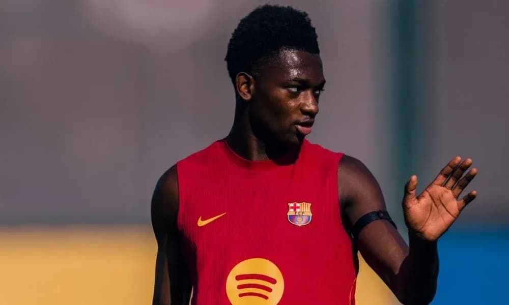 Player in training kit gesturing during practice Player in training kit gesturing during practice