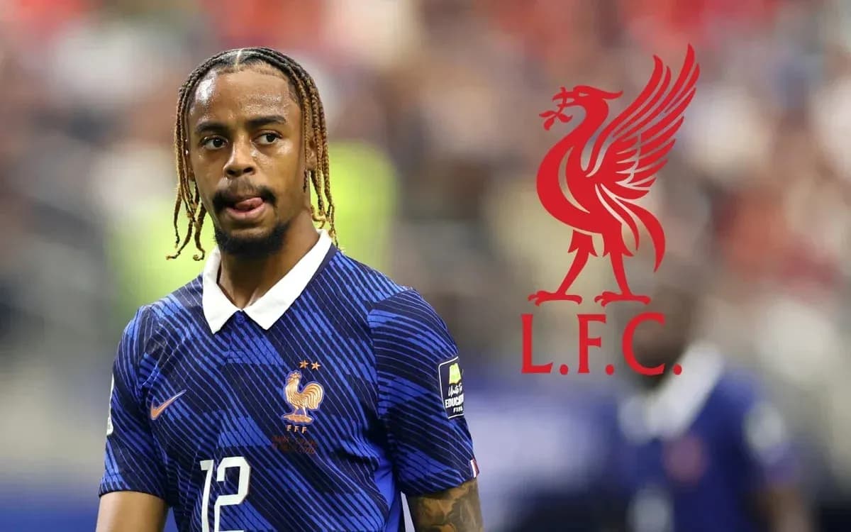 Player in France kit with Liverpool logo background Player in France kit with Liverpool logo background