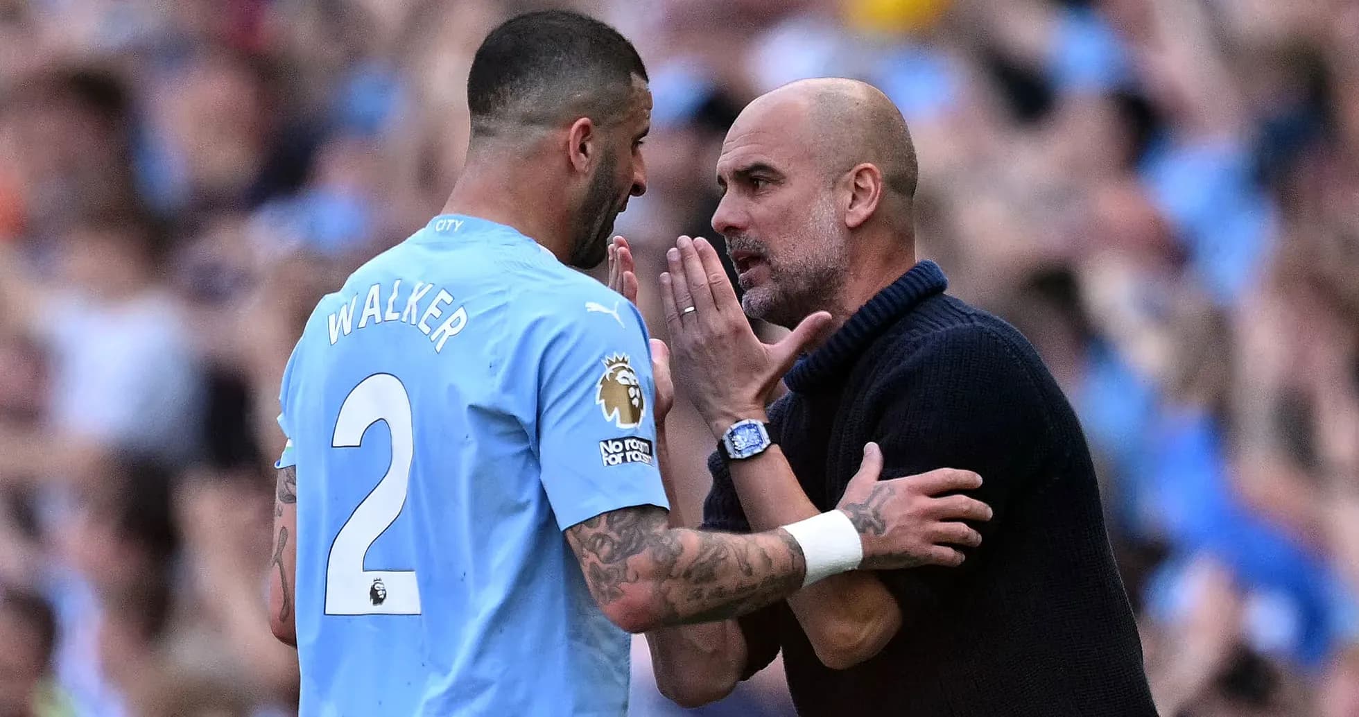 Kyle Walker and manager discussing on the pitch Kyle Walker and manager discussing on the pitch