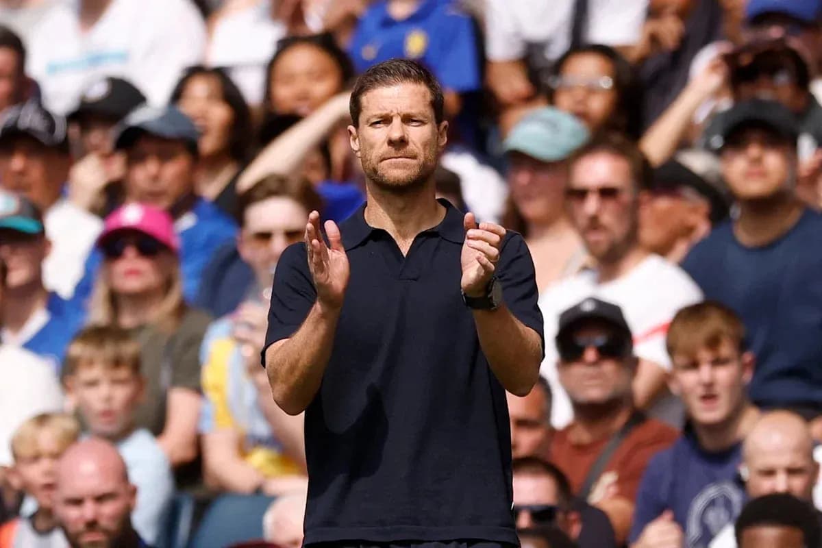 Coach applauding in front of cheering crowd Coach applauding in front of cheering crowd