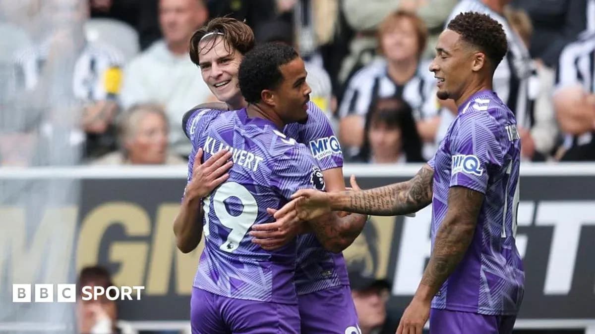 Players celebrating a goal during a match Players celebrating a goal during a match
