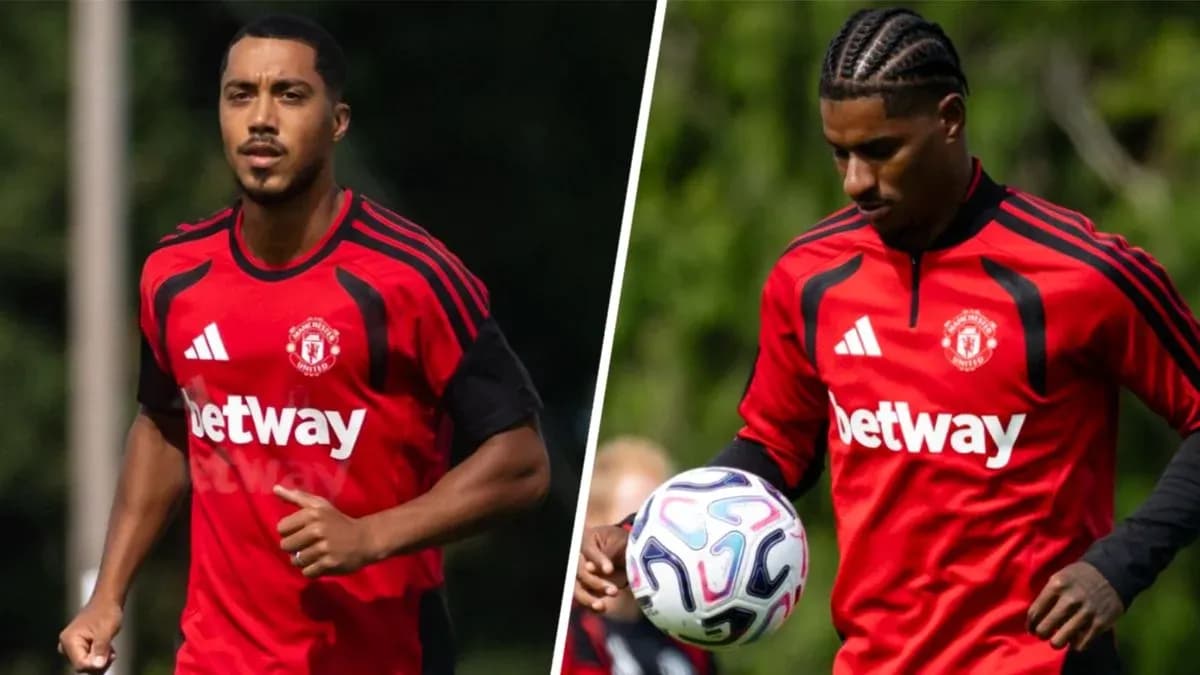 Two players training in Manchester United jerseys Two players training in Manchester United jerseys