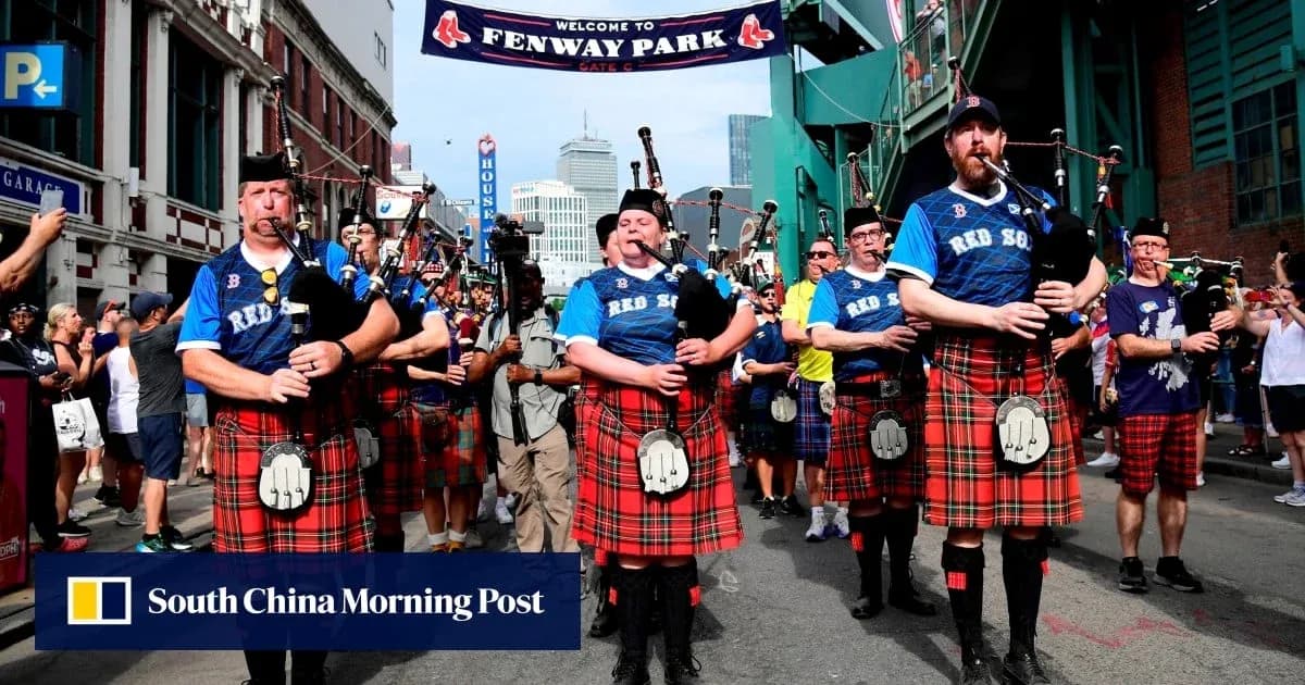 Bagpipe band marching outside Fenway Park Bagpipe band marching outside Fenway Park