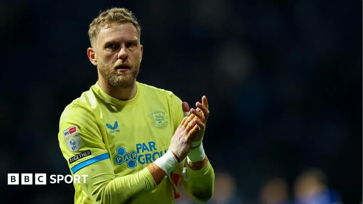 Goalkeeper clapping after a match wearing yellow kit Goalkeeper clapping after a match wearing yellow kit