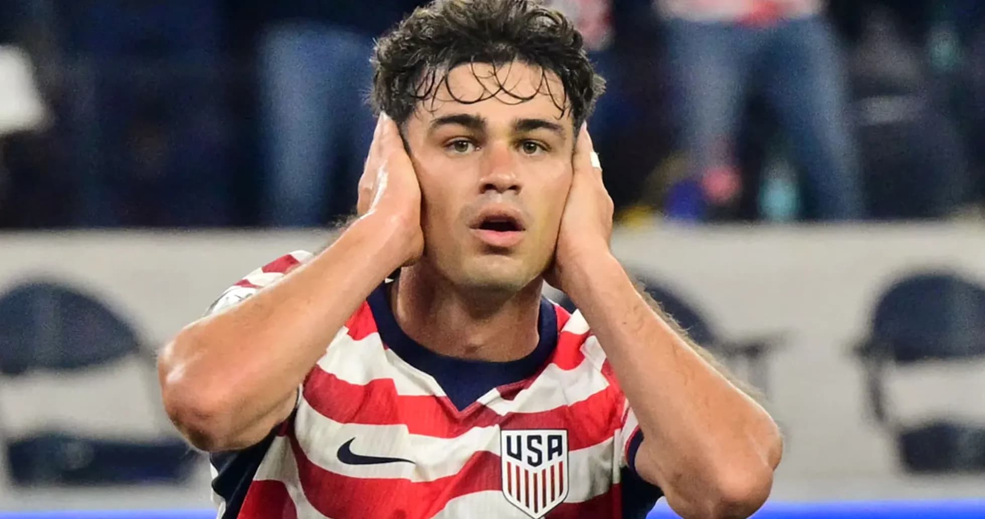 Player with hands on head during match Player with hands on head during match