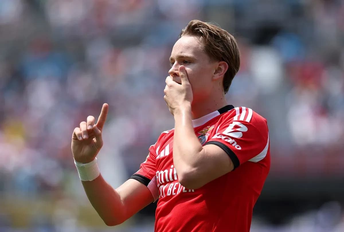 Player celebrating with finger raised during match Player celebrating with finger raised during match
