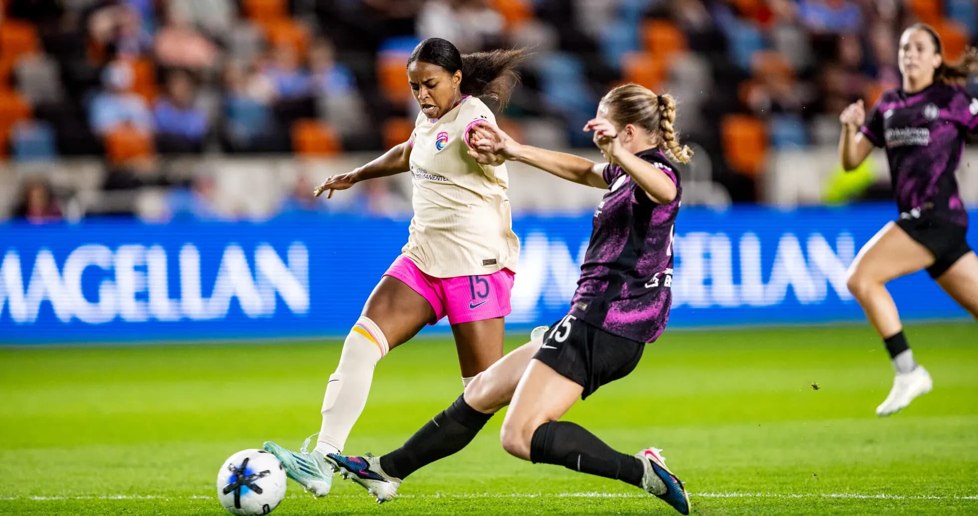 Player tackling during NJ/NY Gotham FC vs Houston Dash match Player tackling during NJ/NY Gotham FC vs Houston Dash match