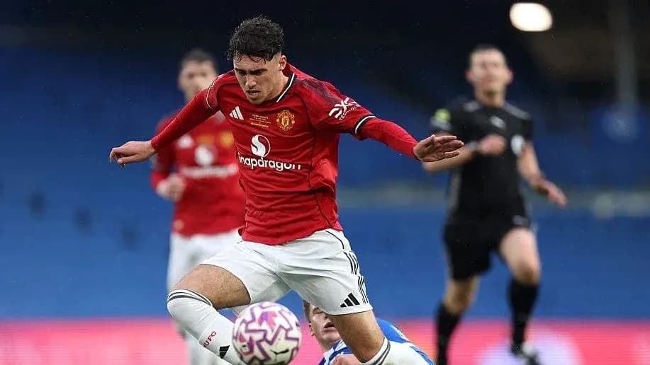 Player in red kit falls while playing football Player in red kit falls while playing football