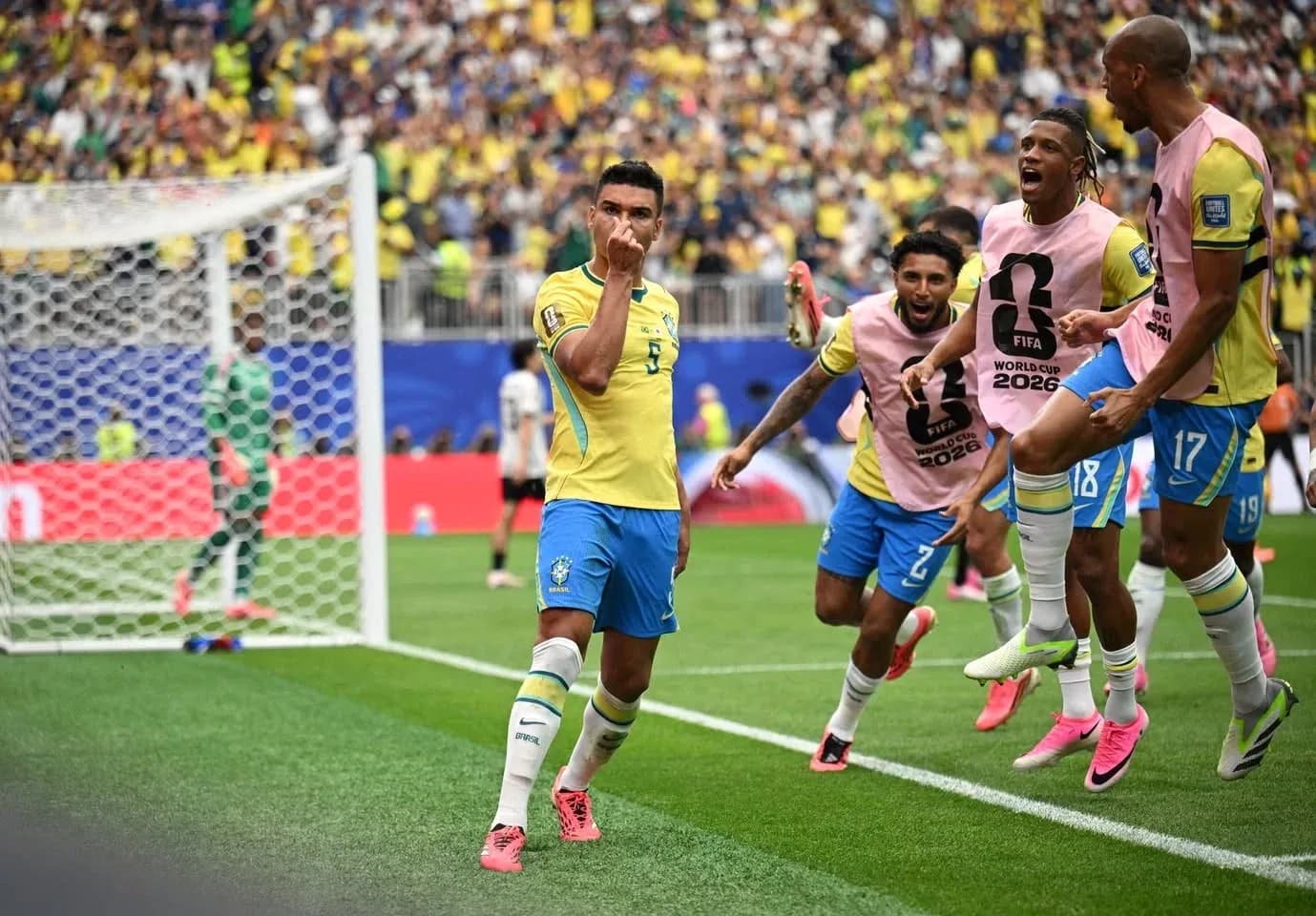 Brazil players celebrating a goal in World Cup 2026 Brazil players celebrating a goal in World Cup 2026