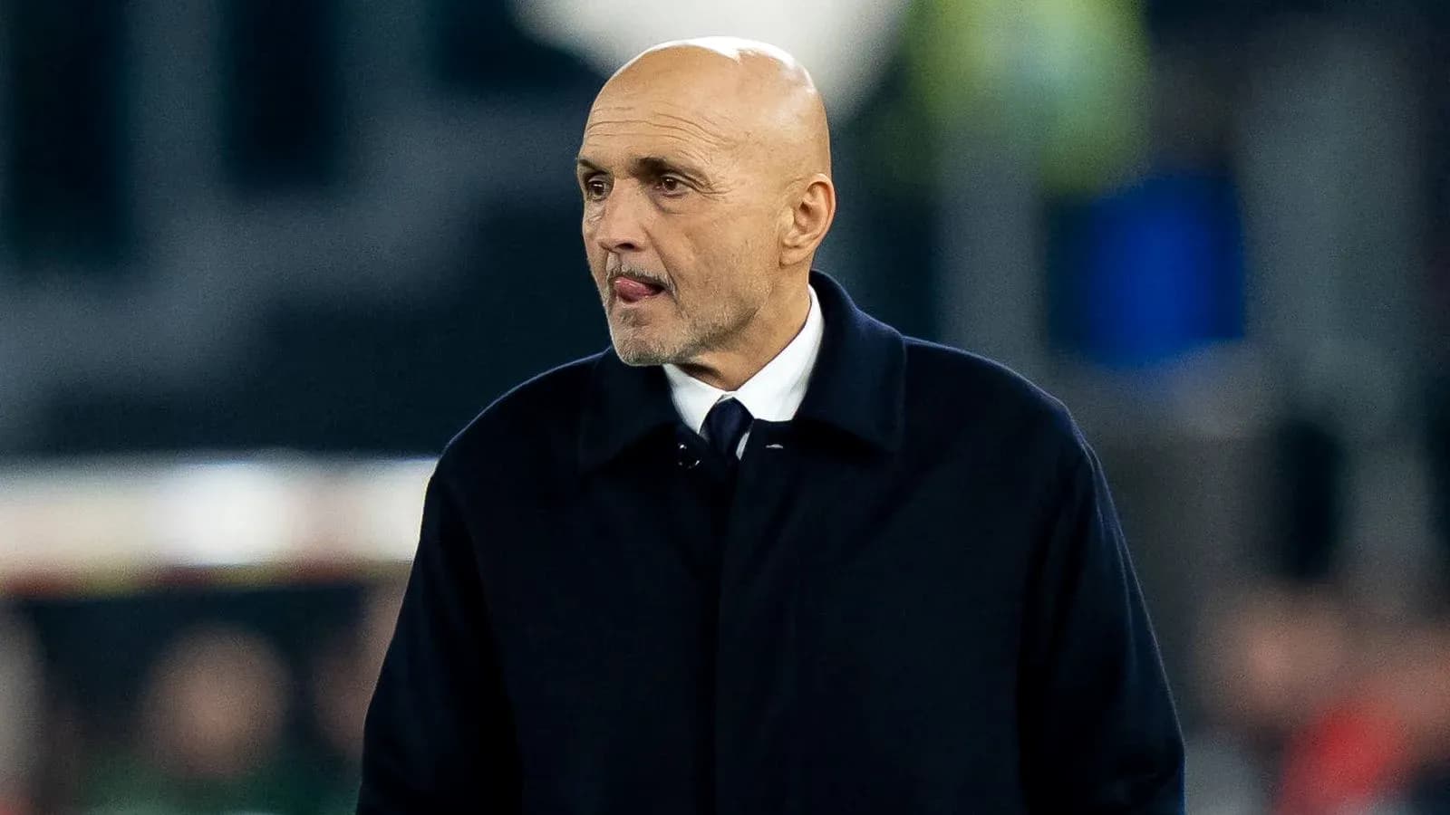Manager walking on the sidelines during match Manager walking on the sidelines during match
