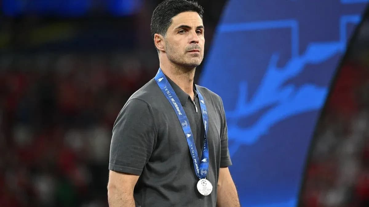 Manager wearing silver medal after final match Manager wearing silver medal after final match