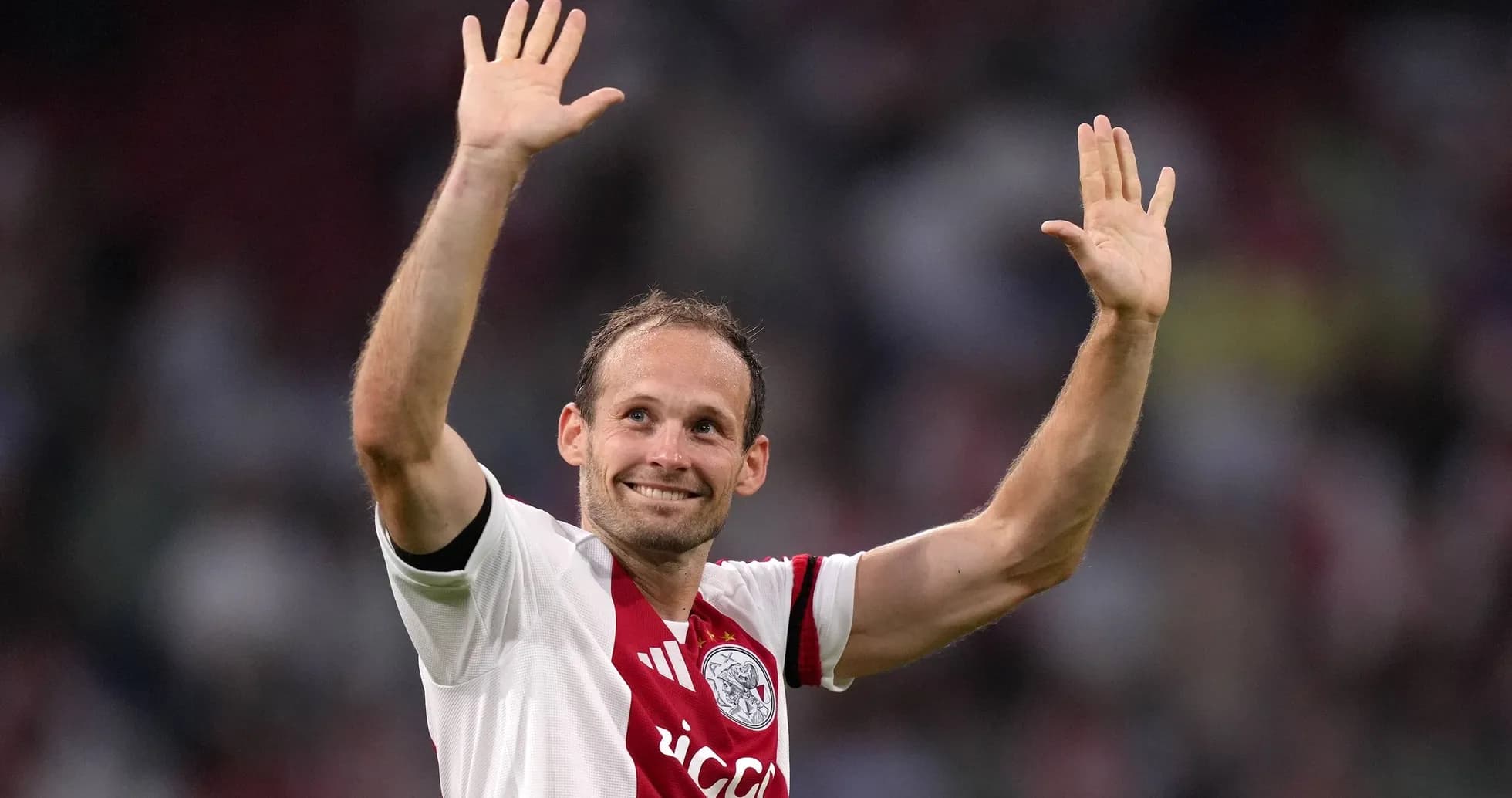 Player waving to the crowd after match Player waving to the crowd after match