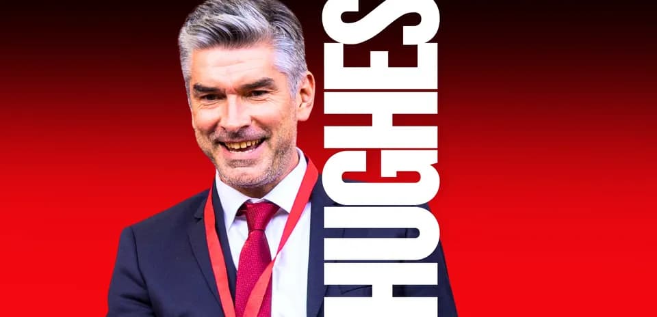 Man in suit smiling with red background Man in suit smiling with red background