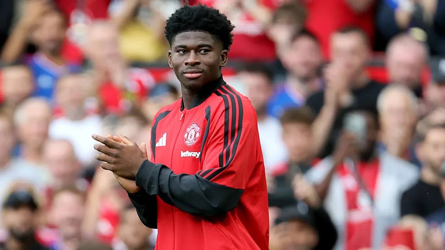 Player in Manchester United jersey acknowledging crowd Player in Manchester United jersey acknowledging crowd
