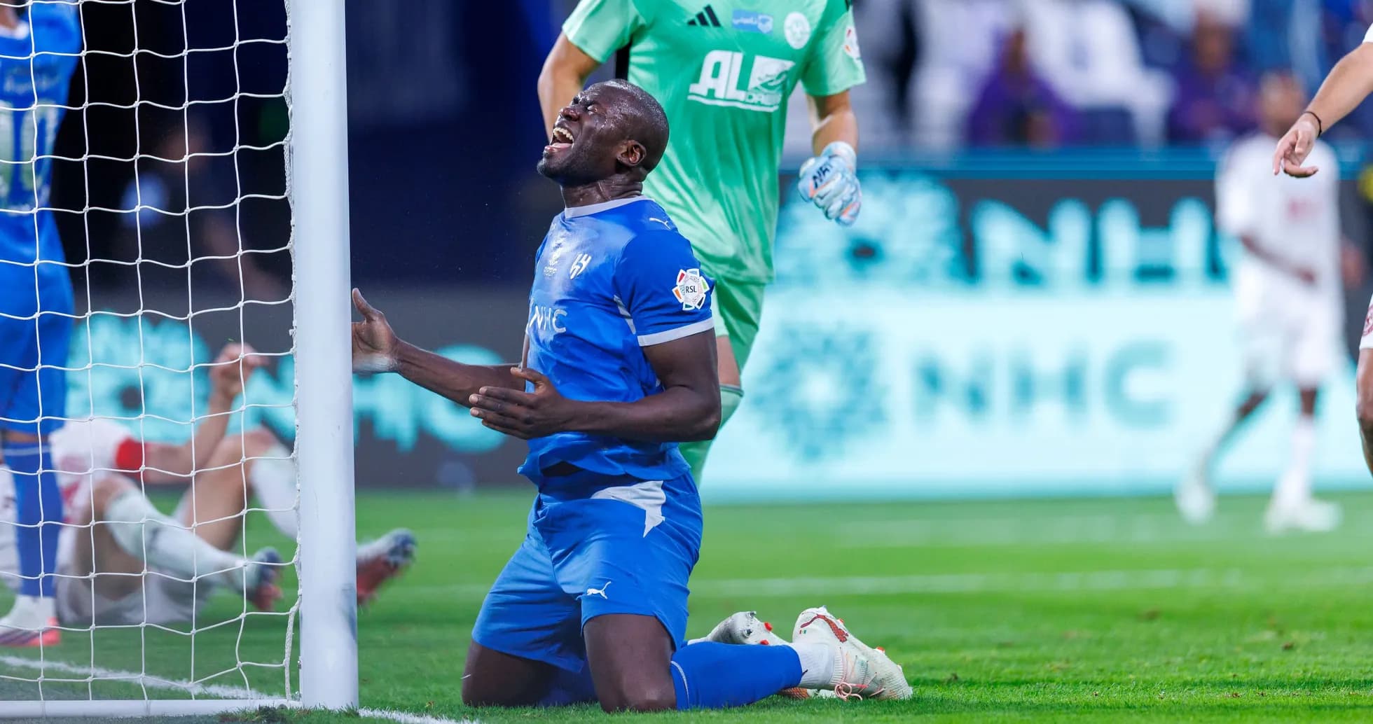 Player reacting after missing a goal opportunity Player reacting after missing a goal opportunity