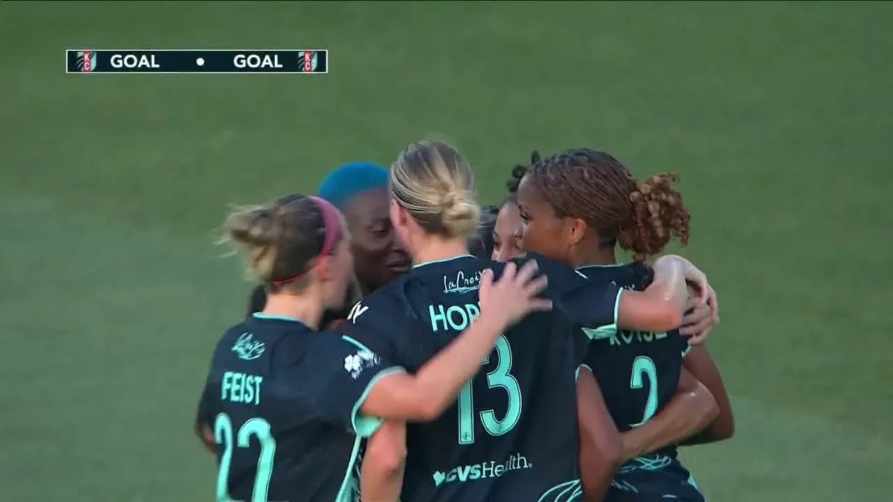 Players celebrating a goal during match Players celebrating a goal during match