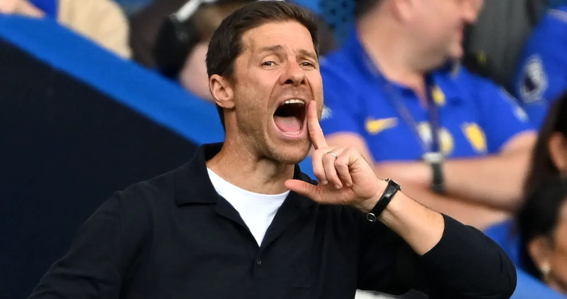 Coach shouting instructions from the sidelines during match Coach shouting instructions from the sidelines during match