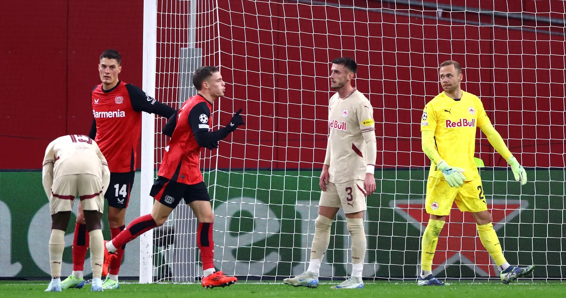 Bayer Leverkusen players celebrating a goal Bayer Leverkusen players celebrating a goal