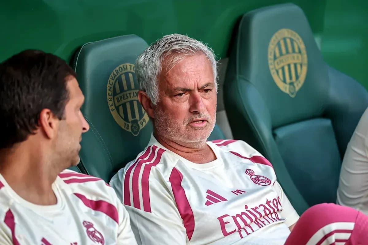 Coaches seated on bench during match Coaches seated on bench during match