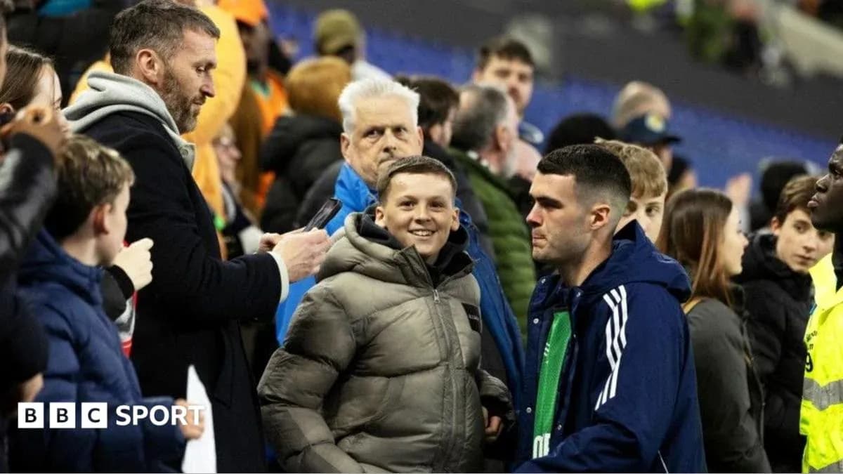 Fans interacting in the stands after the match Fans interacting in the stands after the match