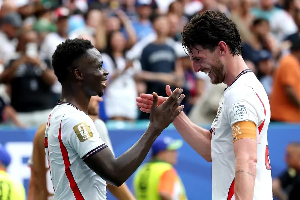 Two players celebrating on the field after match Two players celebrating on the field after match