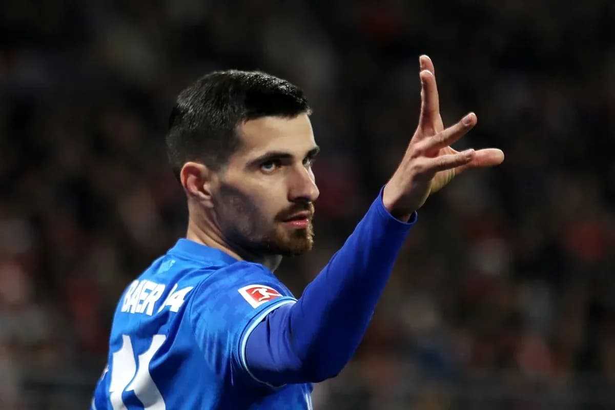 Player gesturing during a football match Player gesturing during a football match