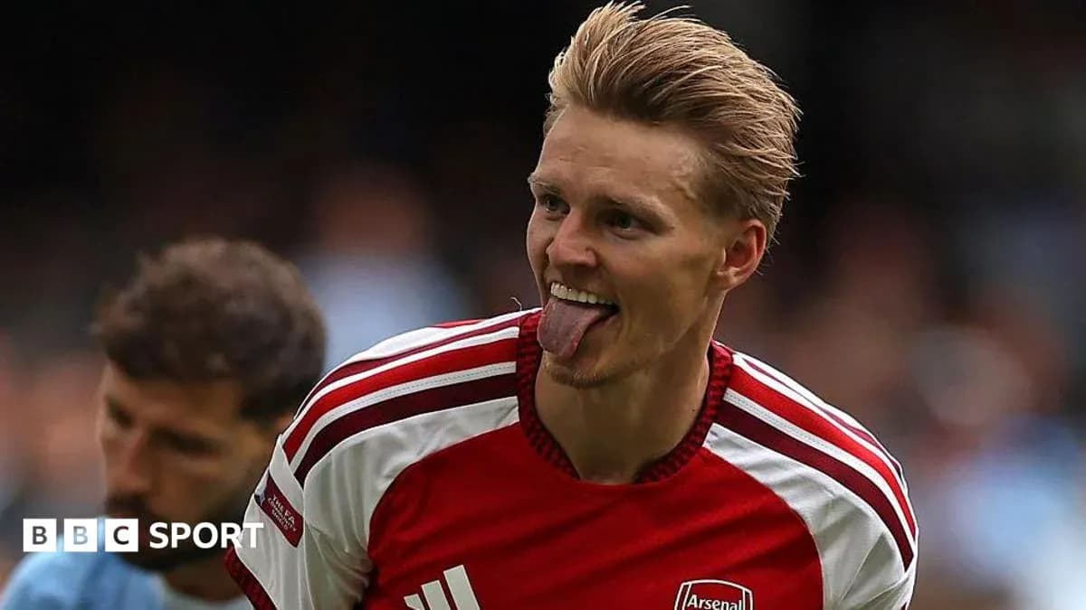 Arsenal player celebrating during a match Arsenal player celebrating during a match
