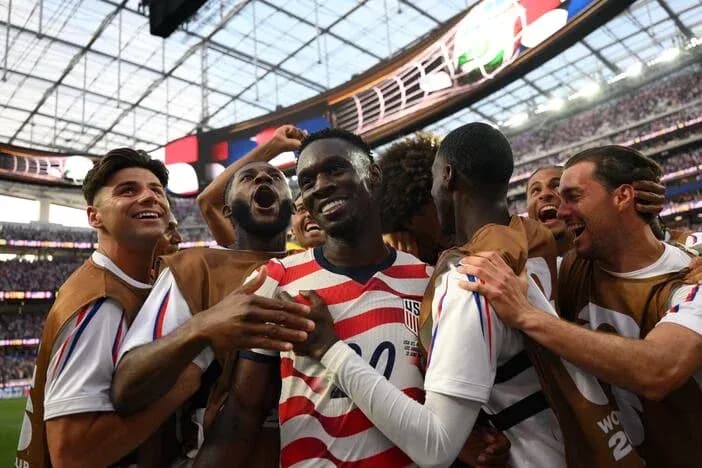 US team celebrating a goal during match US team celebrating a goal during match