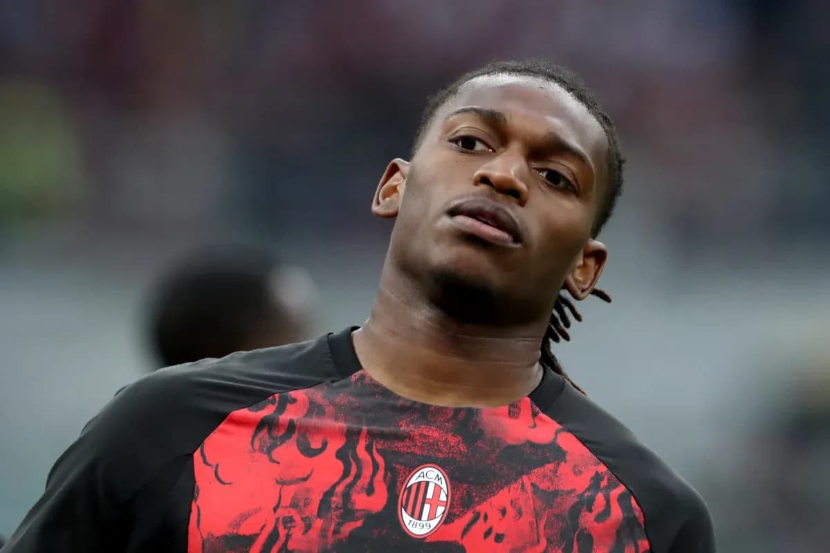 Player warming up in AC Milan training gear Player warming up in AC Milan training gear