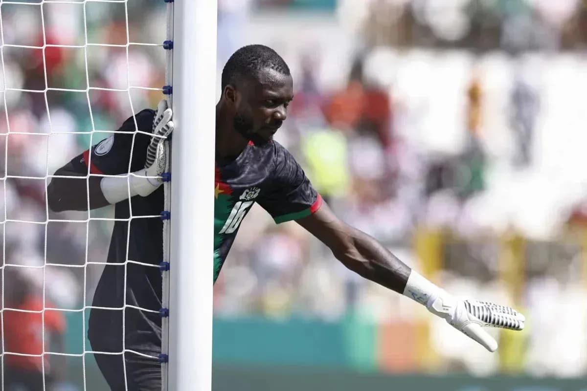 Goalkeeper signaling during a football match Goalkeeper signaling during a football match