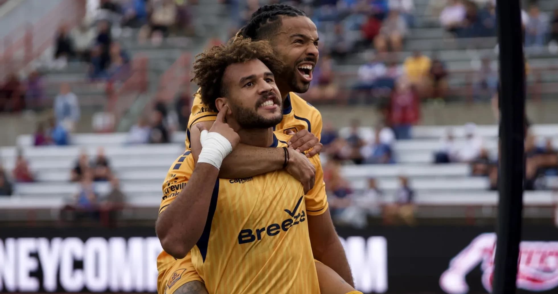 Indy Eleven players celebrating a goal Indy Eleven players celebrating a goal