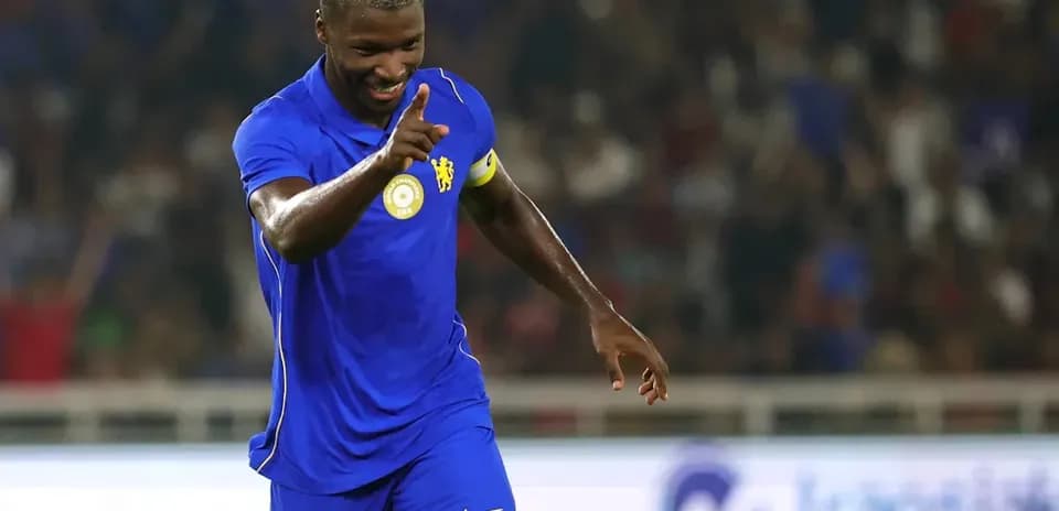 Player celebrating a goal during a match Player celebrating a goal during a match