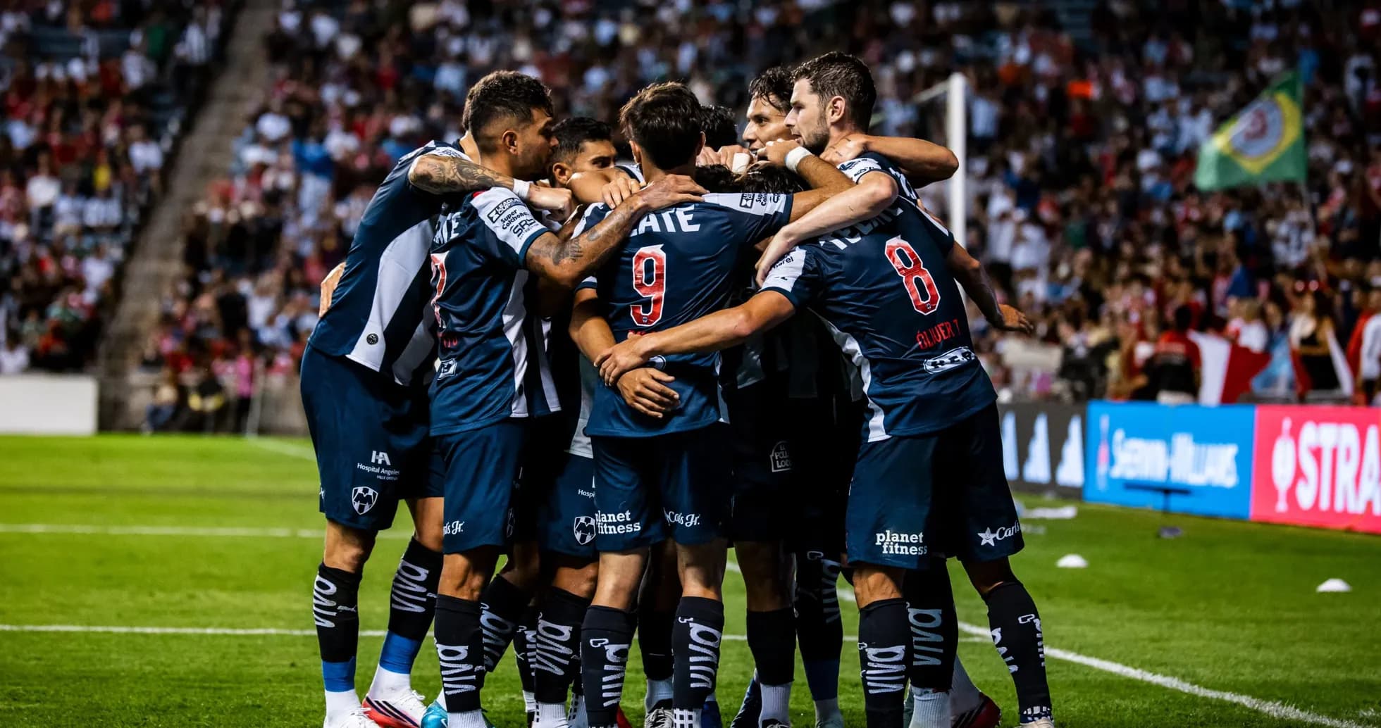Monterrey players celebrating a goal during match Monterrey players celebrating a goal during match
