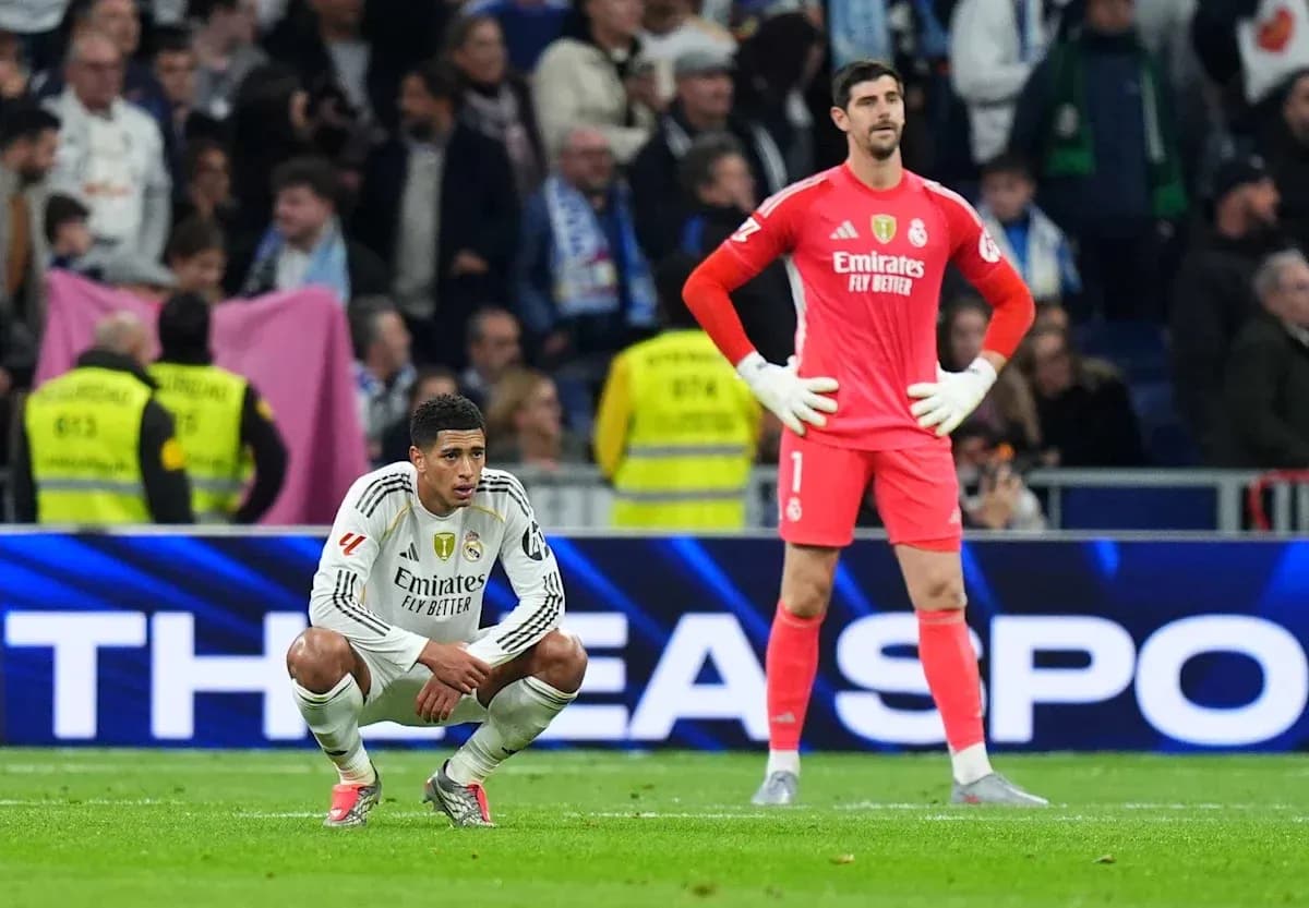 Real Madrid players dejected after a match Real Madrid players dejected after a match