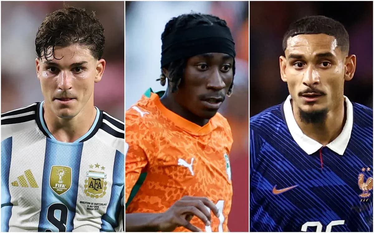 Three football players from different teams in action Three football players from different teams in action