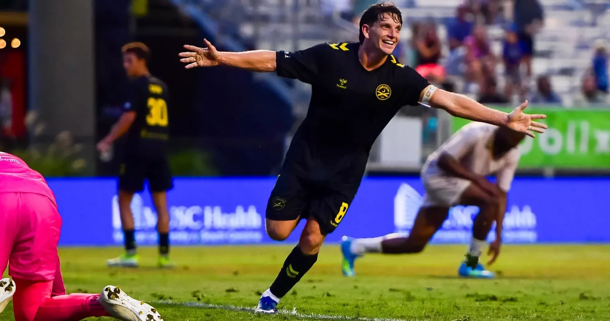 Player celebrating goal during Charleston Battery match Player celebrating goal during Charleston Battery match
