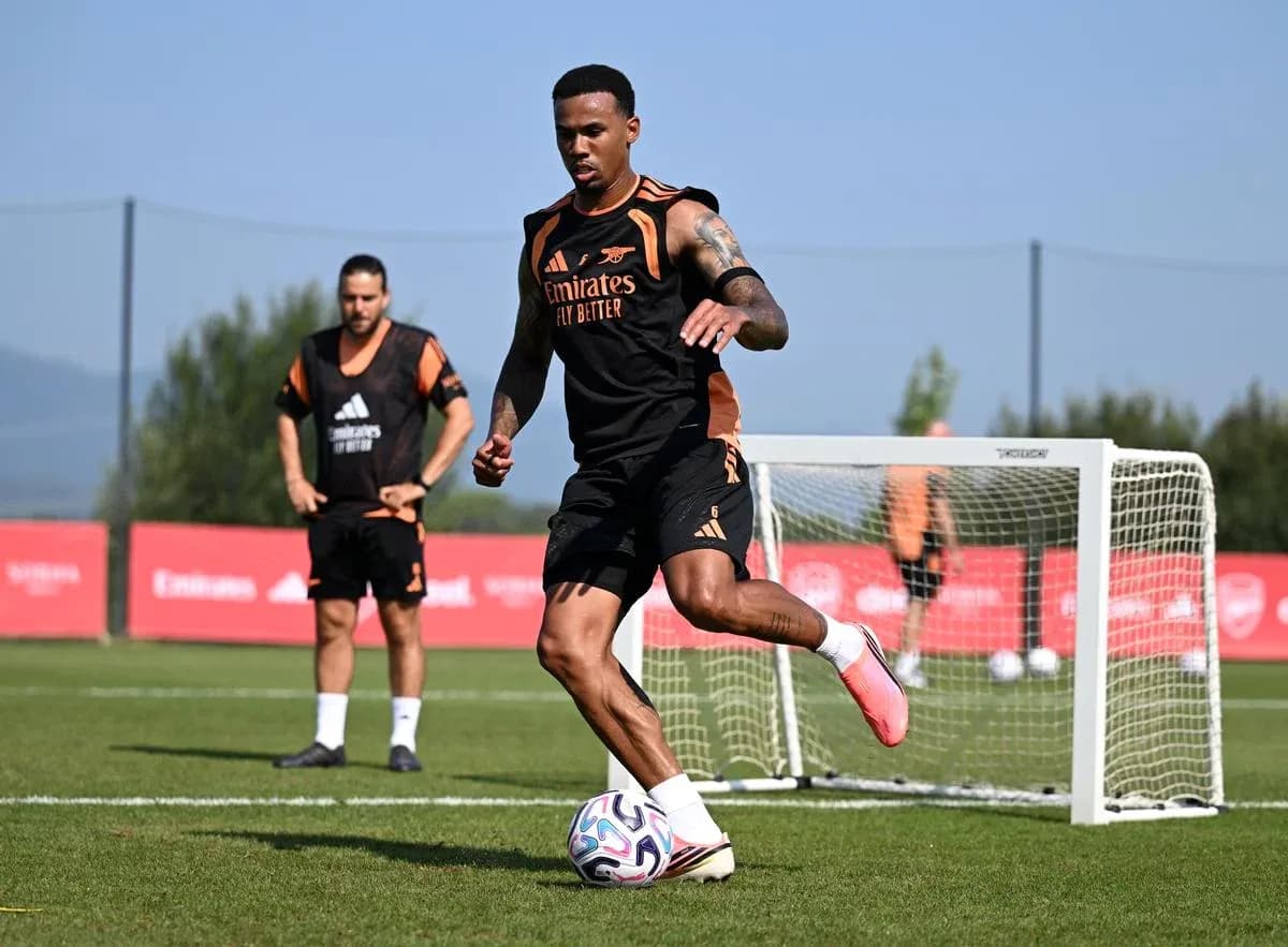 Player training with a soccer ball on pitch Player training with a soccer ball on pitch
