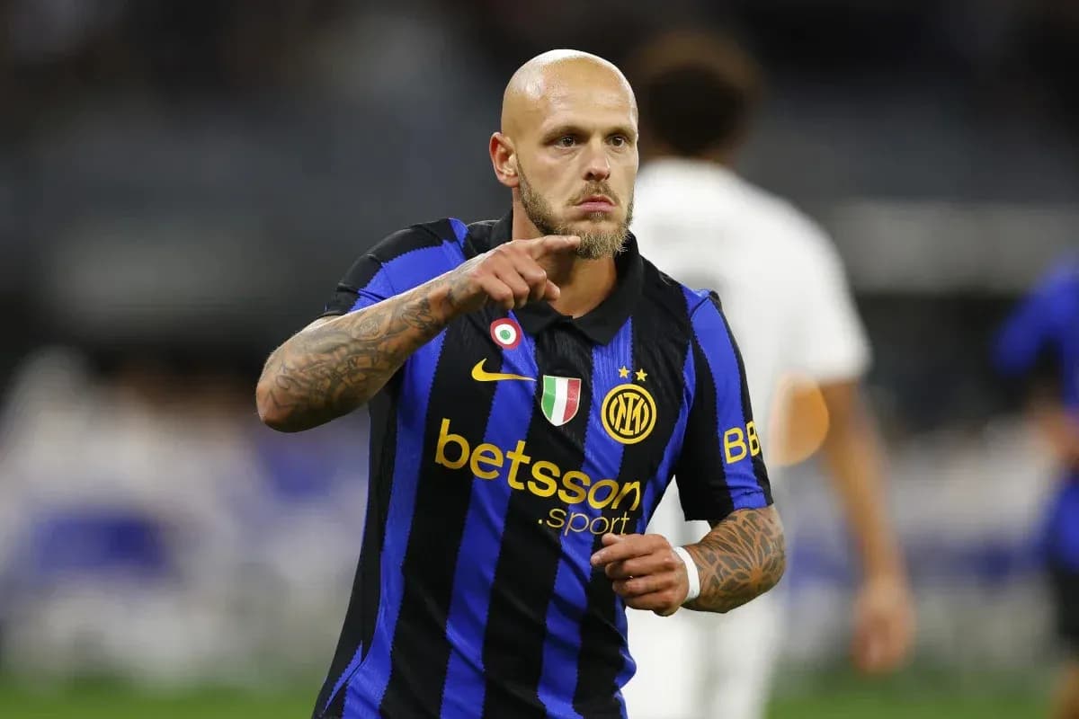 Player celebrating with a gesture in Inter Milan jersey Player celebrating with a gesture in Inter Milan jersey