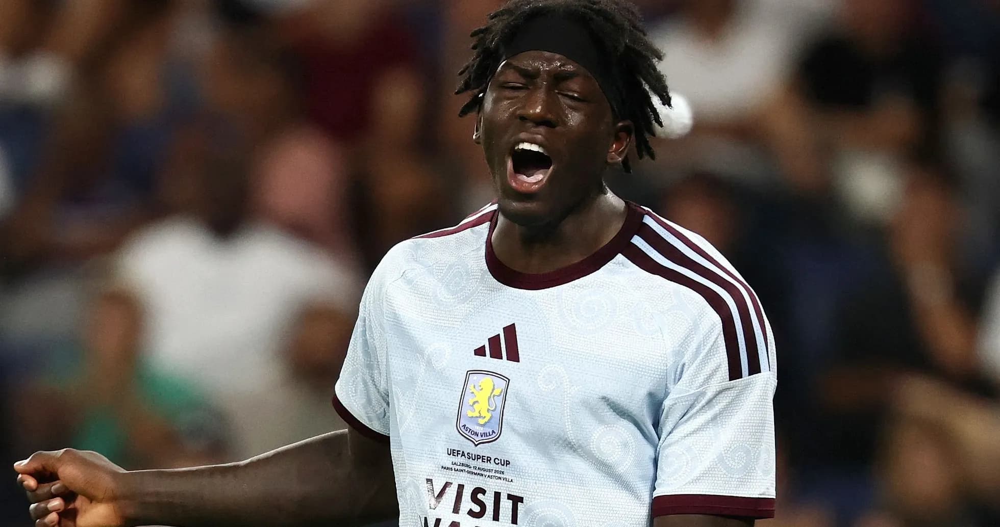 Player in Aston Villa kit shouting during match Player in Aston Villa kit shouting during match