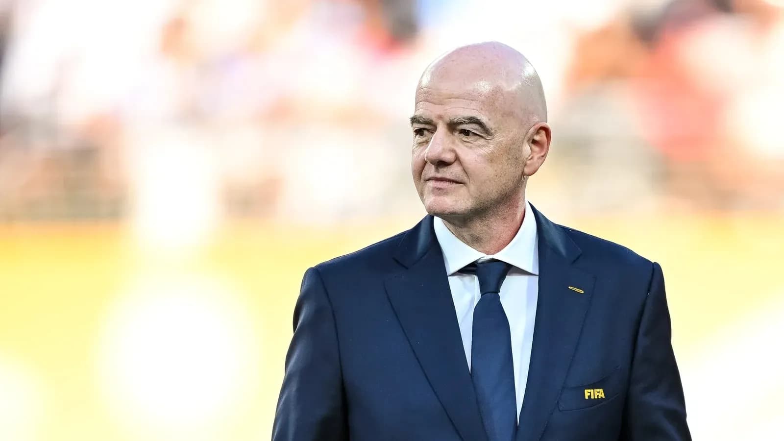 FIFA official walking on the field before match FIFA official walking on the field before match