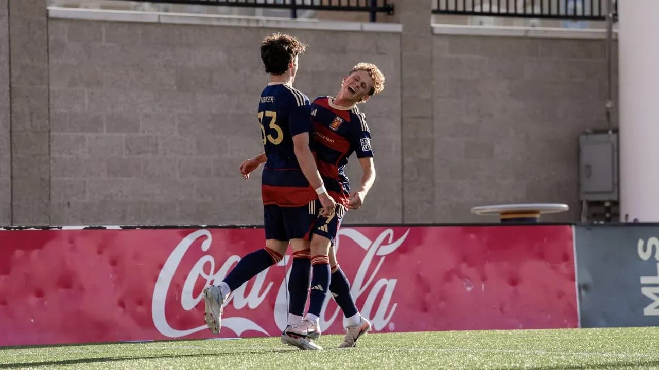 Players celebrating a goal during match Players celebrating a goal during match