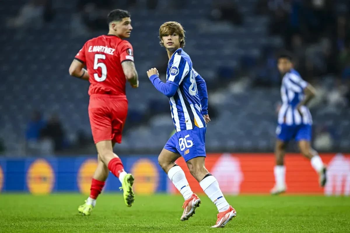 Player in blue jersey running during football match Player in blue jersey running during football match