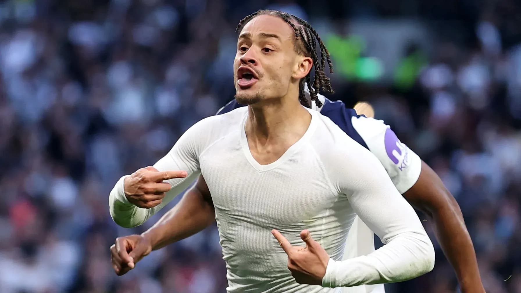 Player celebrating and pointing during match Player celebrating and pointing during match