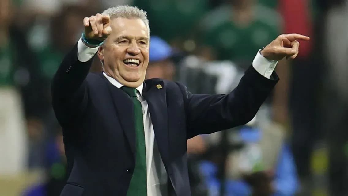 Coach celebrating and pointing during a match Coach celebrating and pointing during a match