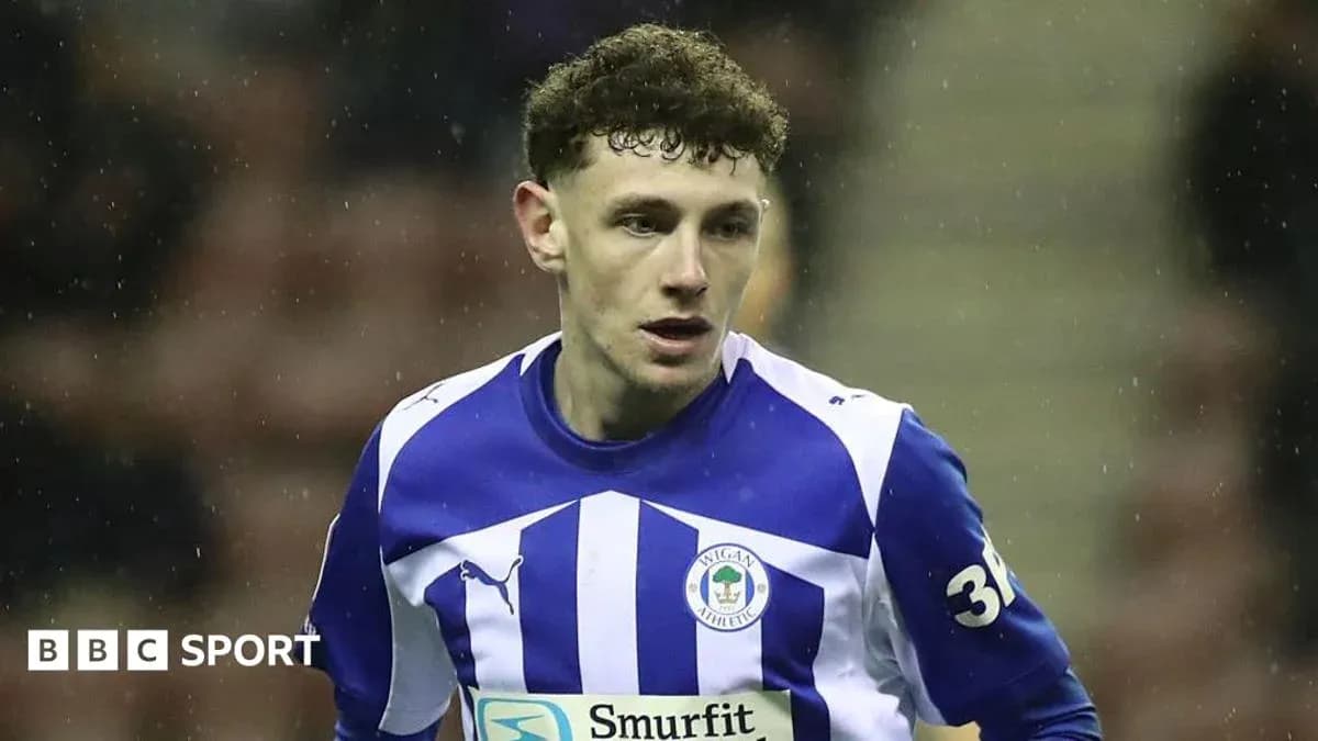 Player wearing Wigan Athletic kit during match Player wearing Wigan Athletic kit during match