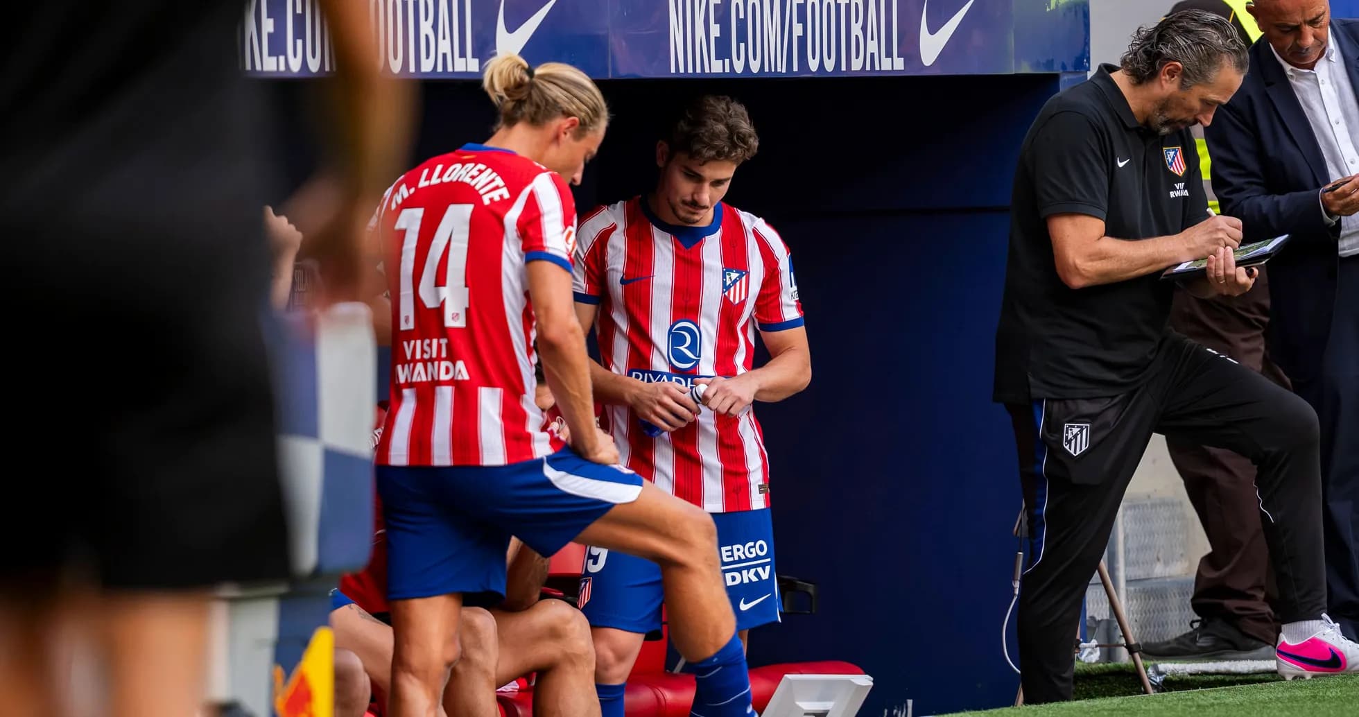 Atletico Madrid players and staff on the bench Atletico Madrid players and staff on the bench